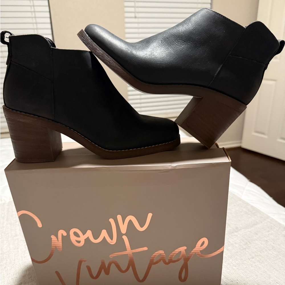 Black booties NIB.  Size 9